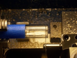 Diamond blade cutting a test tube on a mini-lathe