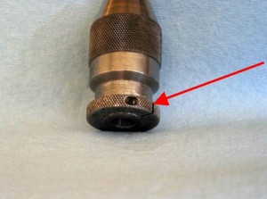Slotted collar locking screw