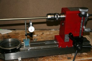 Photo 2: Dial indicator mounted to align the spindle with the tableâ€™s X axis.
